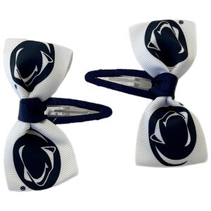 two white ribbon bows with clips featuring navy Penn State Athletic Logos